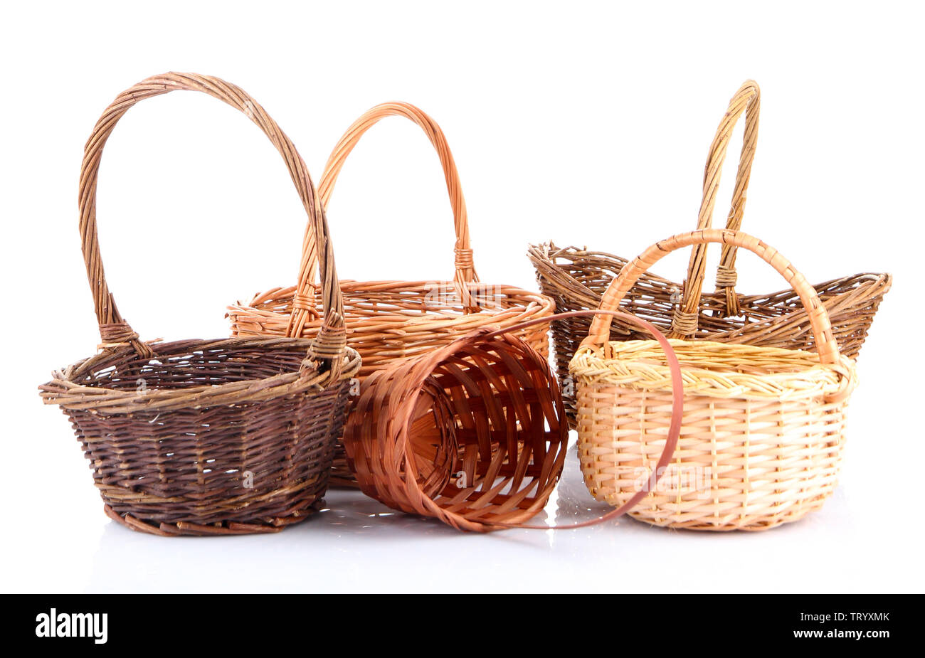 Empty wicker baskets, isolated on white Stock Photo Alamy
