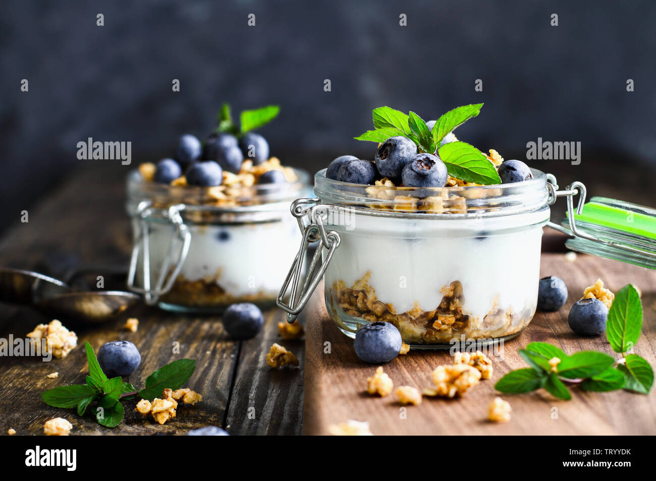 Healthy breakfast of blueberry parfaits made with fresh fruit, Greek