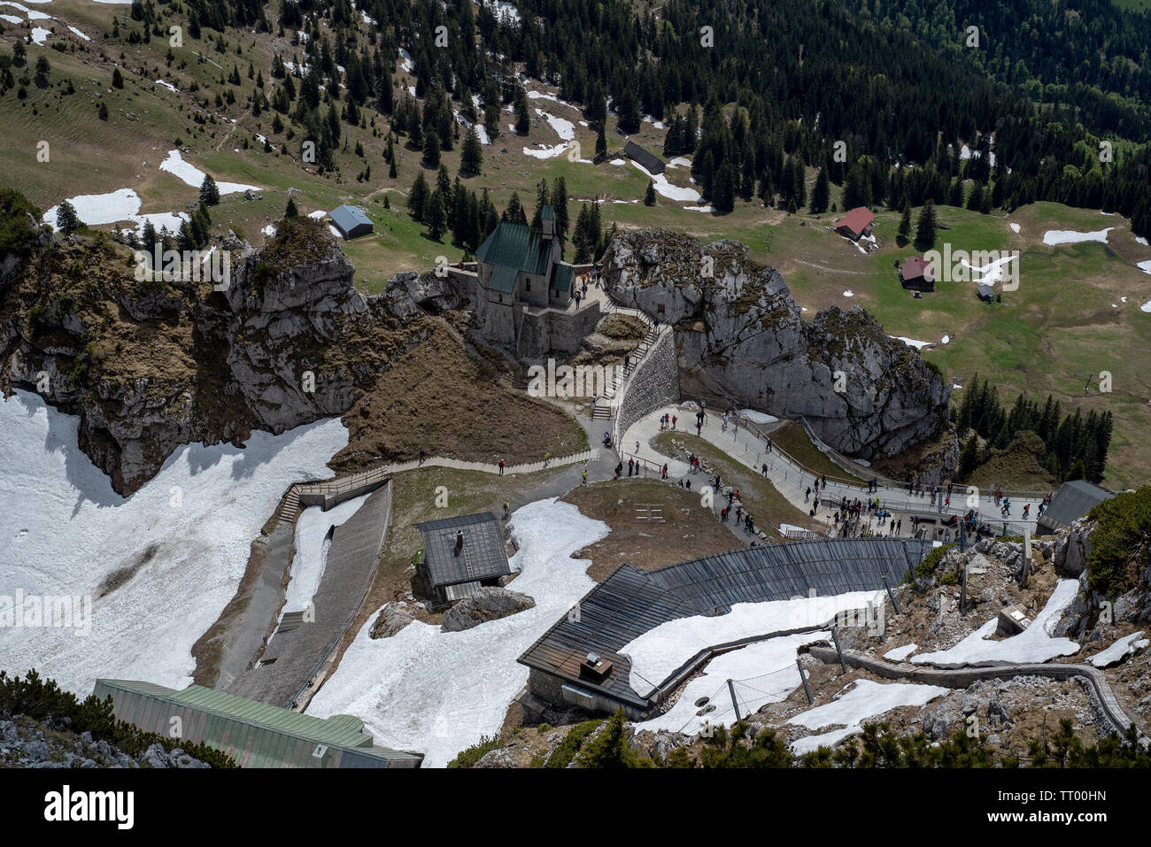 Bayrischzell, Bavaria, Germany - June 1, 2019.  Tourists enjoy a nice spring day on Mount Wendelstein , viewed from the top Stock Photo