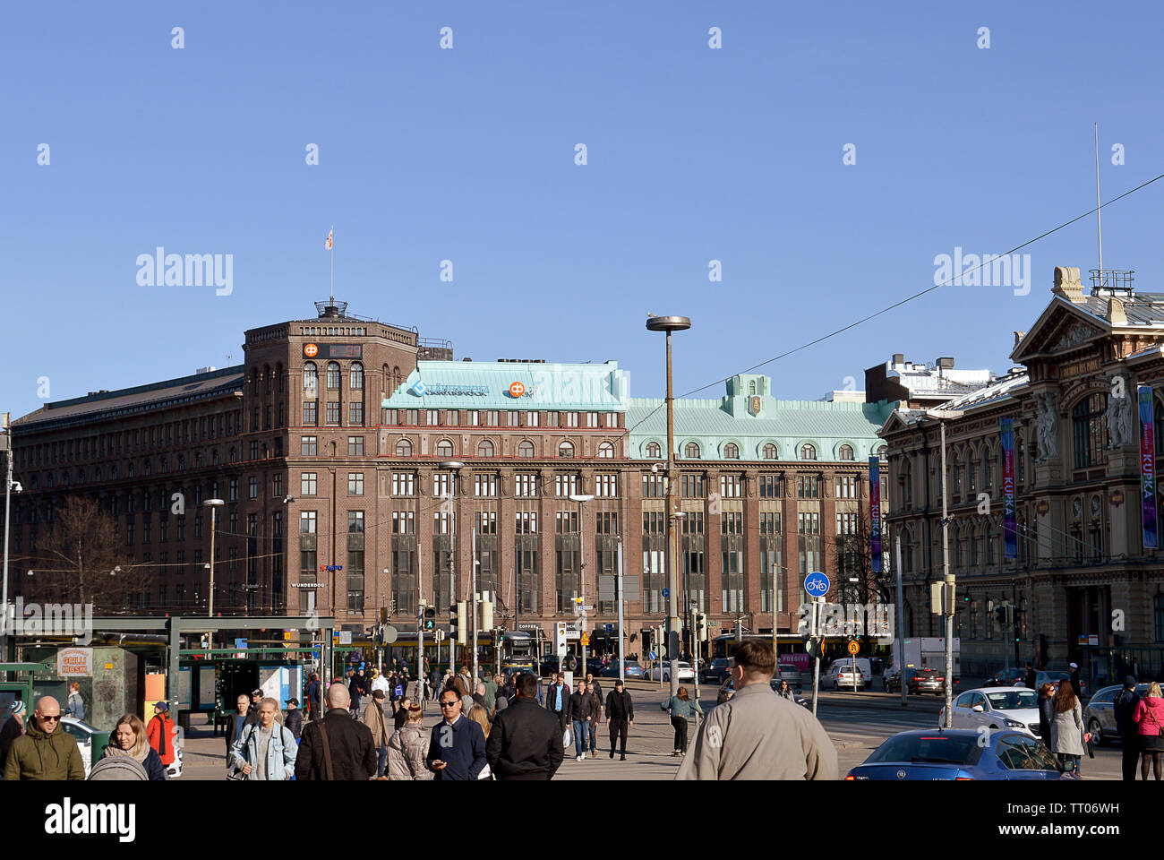 HELSINKI, FINLAND - 6 APRIL 2019: Rautatientori (Helsinki Railway Square) and Mikonkatu are busy with Saturday afternoon shoppers.. Stock Photo