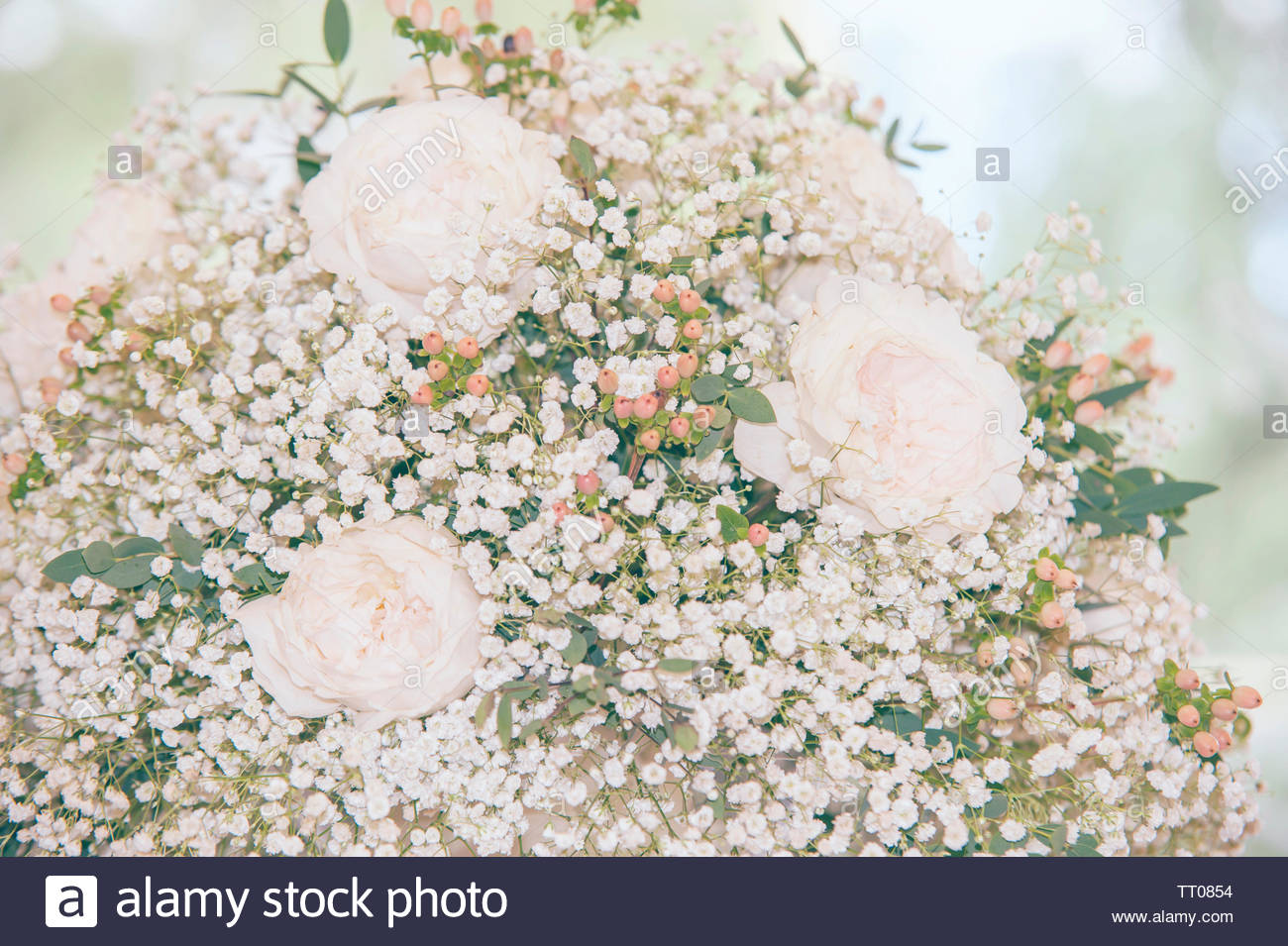 Light Floral Wedding Bouquet With Pastel Vintage Toning For