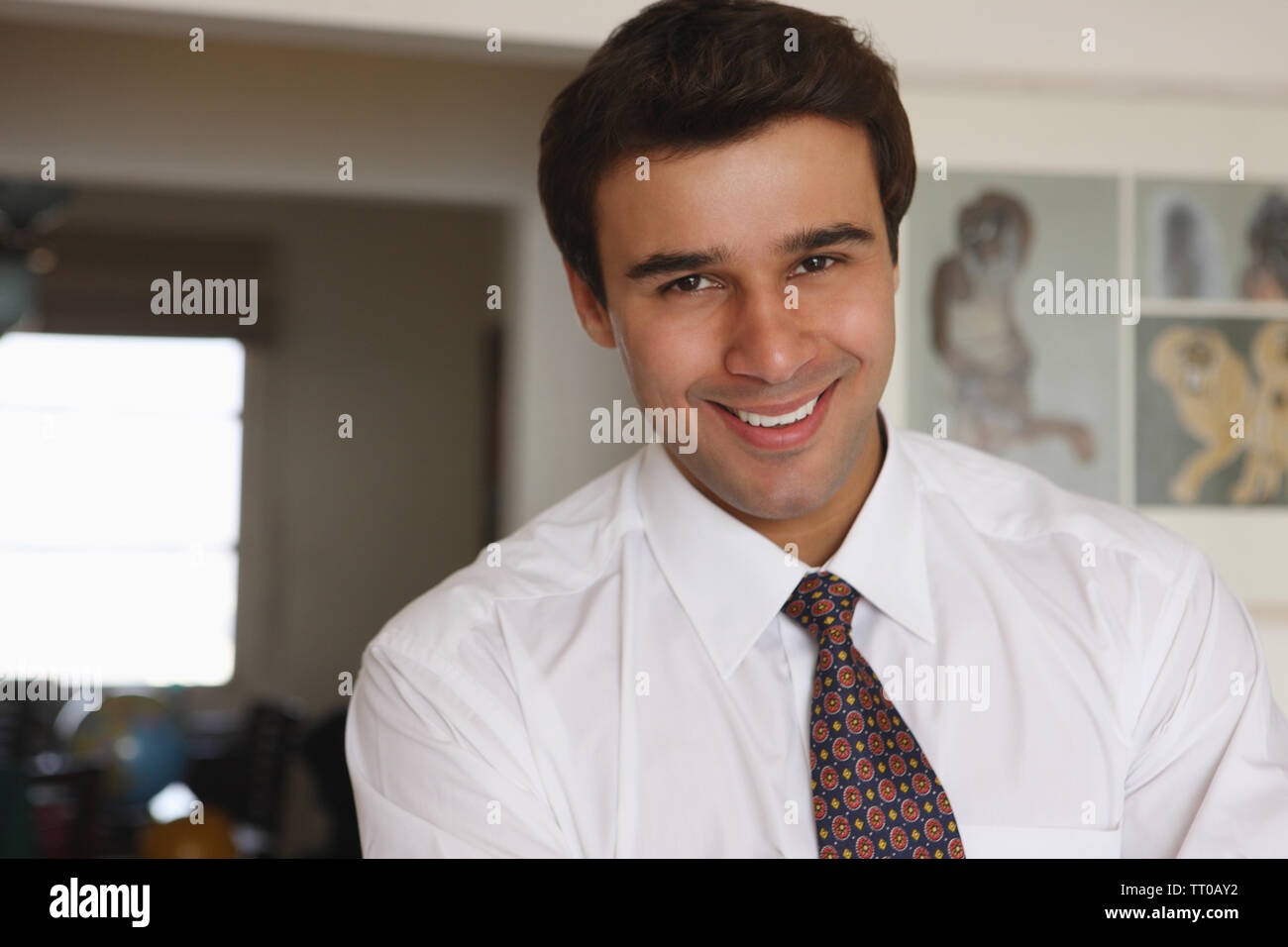 Portrait of a businessman smiling Stock Photo - Alamy
