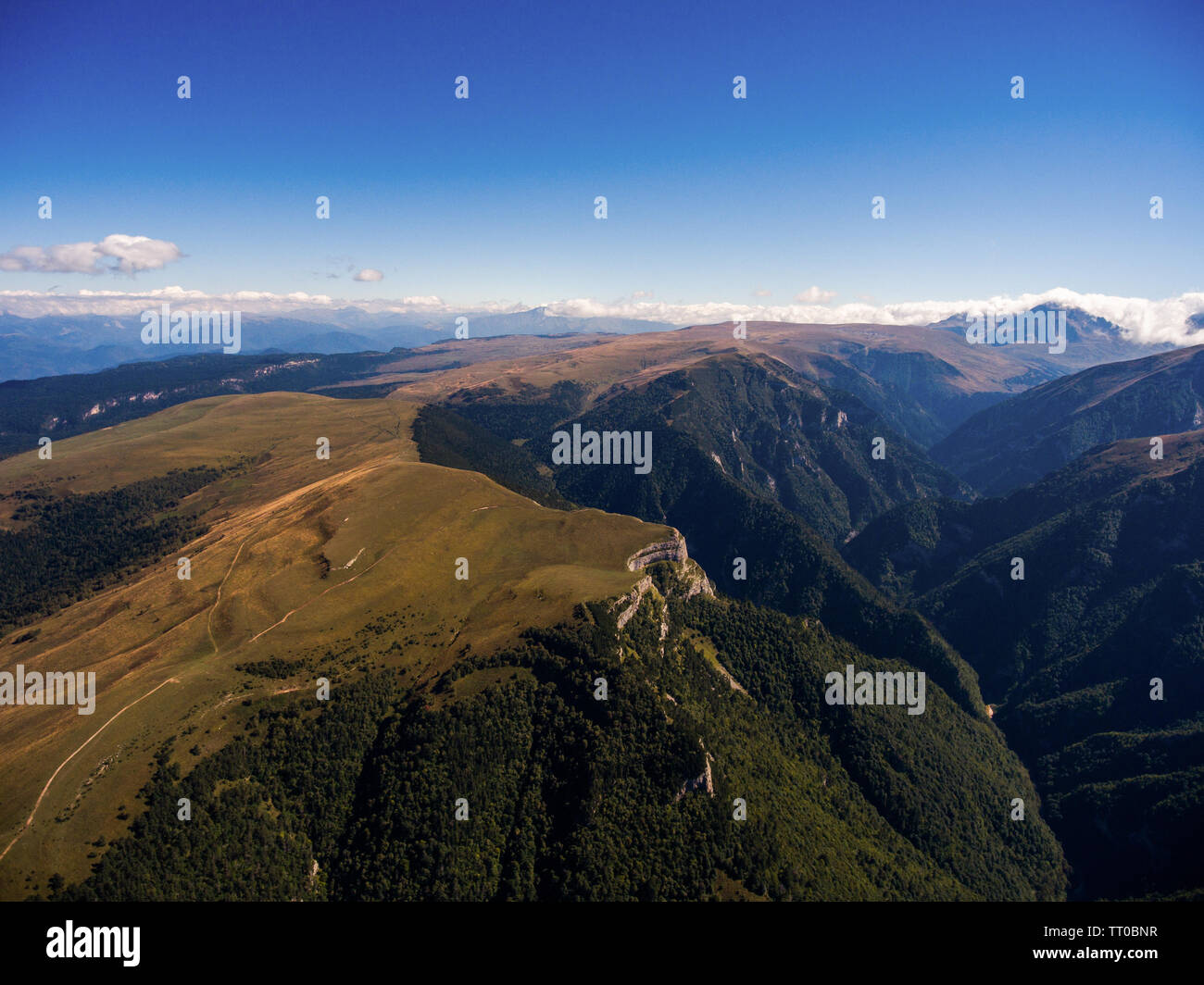 Aerial view of the mountain canyon and alpine meadows. Russia Stock ...