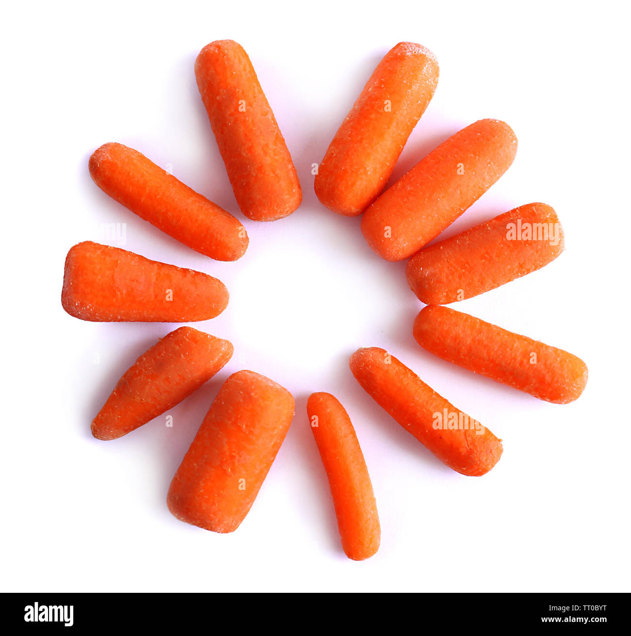 Baby carrot sticks isolated on white Stock Photo Alamy