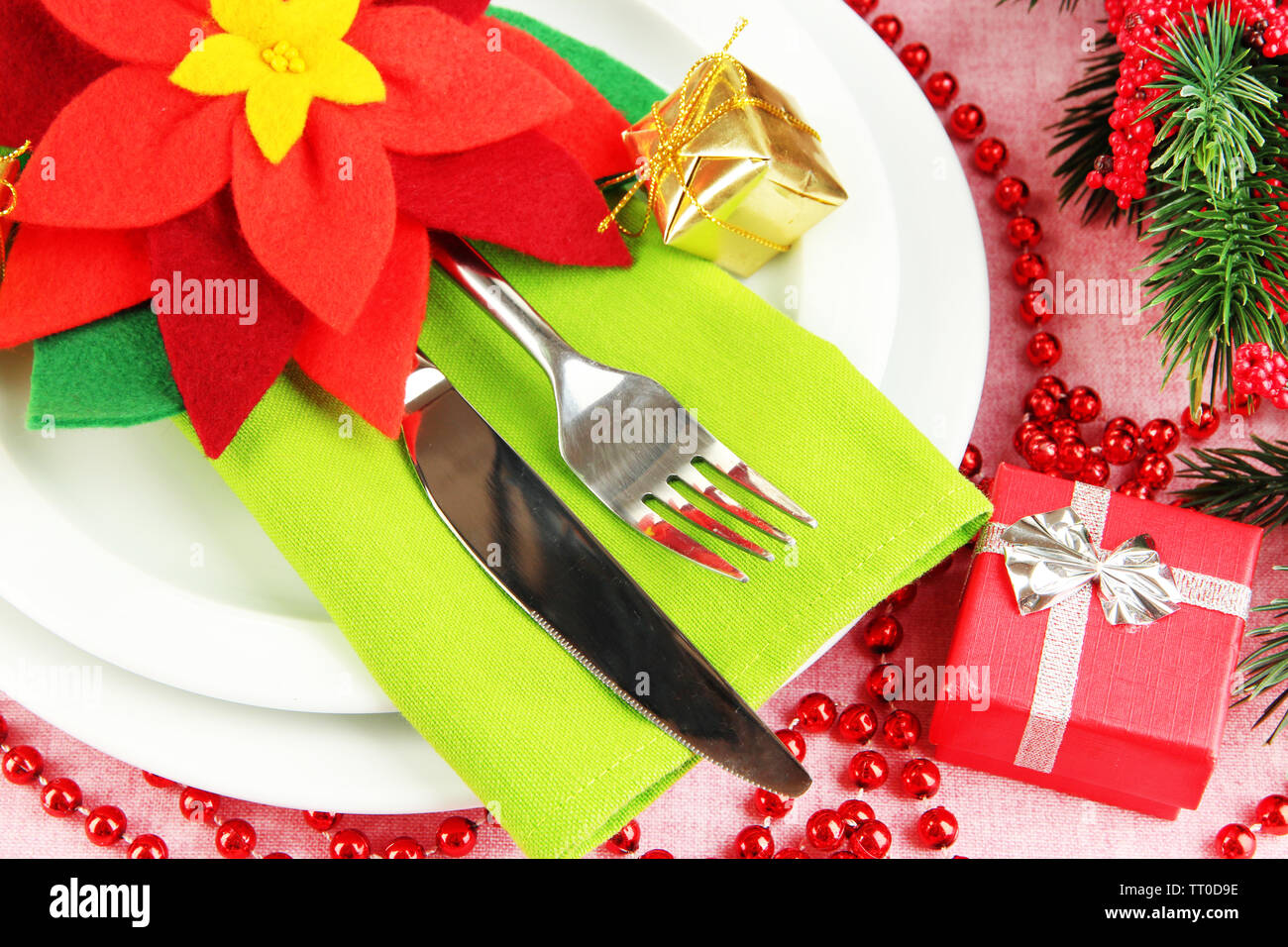 Christmas table setting with festive decorations close up Stock Photo