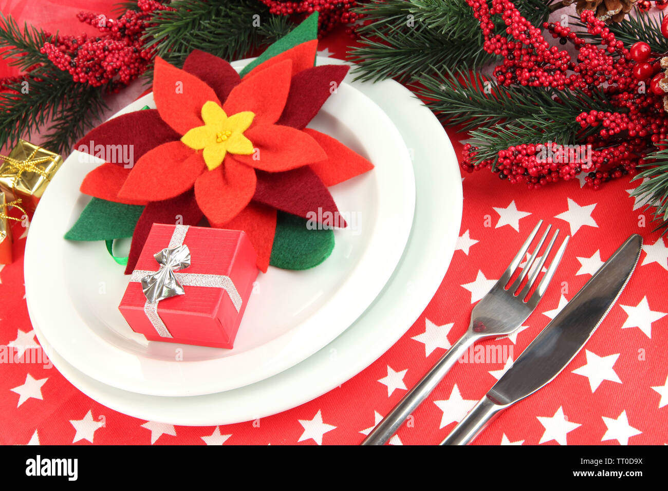 Christmas table setting with festive decorations close up Stock Photo