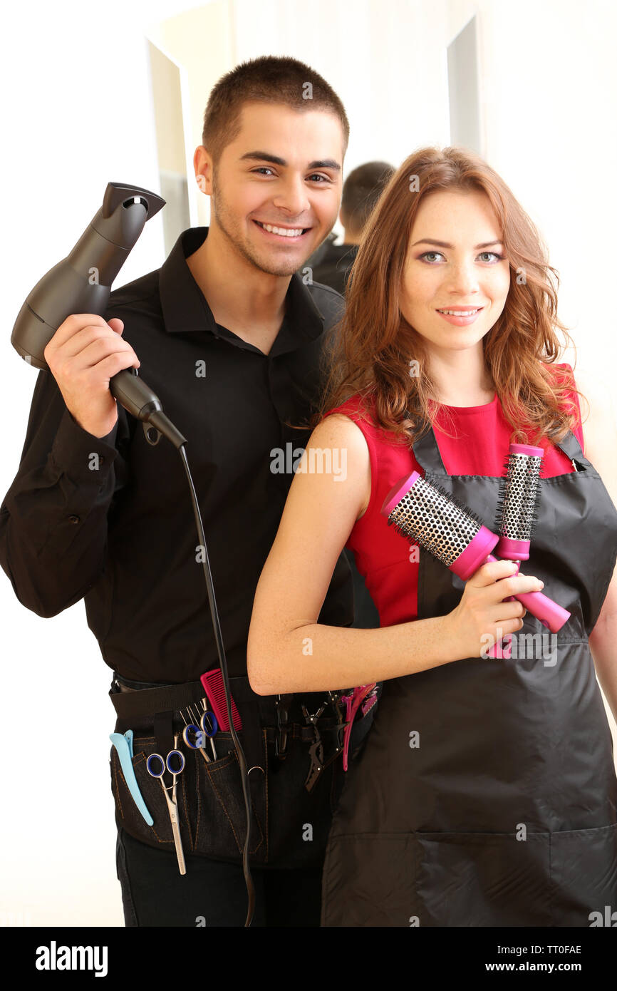 Young man and woman hairdressers in beauty salon Stock Photo Alamy