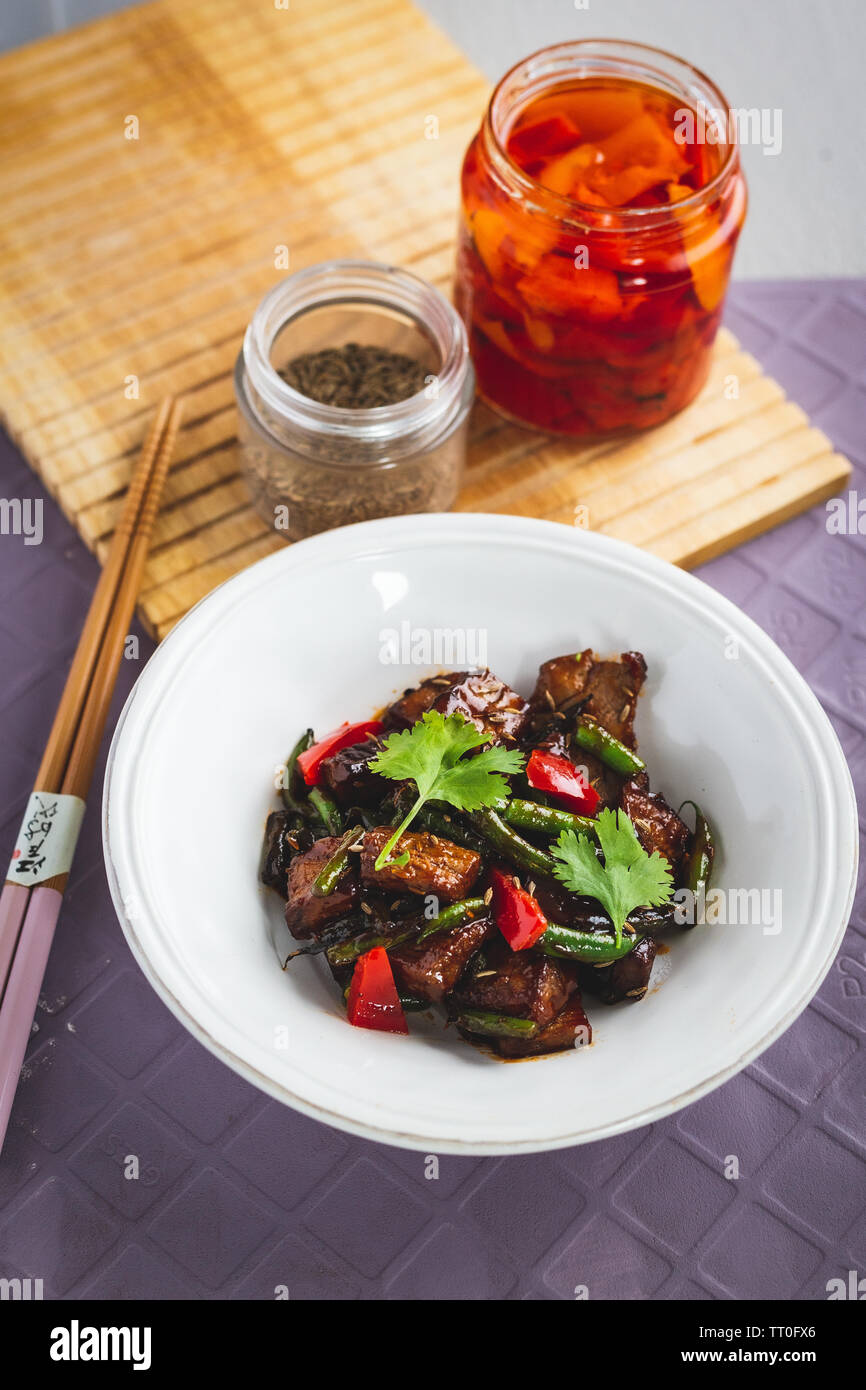 Lamb with Cumin, Green Beans and Red Pepper Stock Photo Alamy