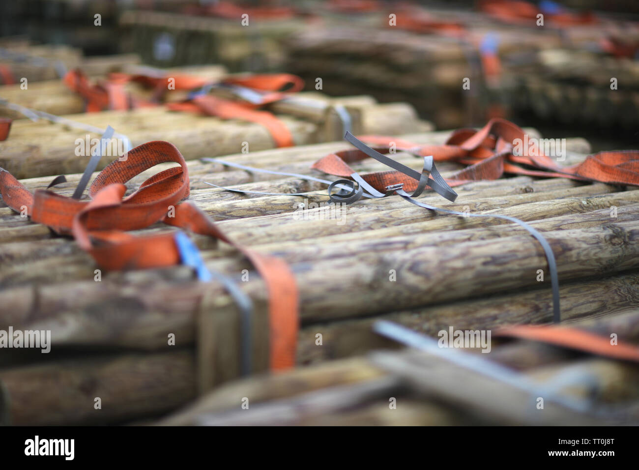 Bags on pallets of wood products prepared for export in stock in trading port Stock Photo