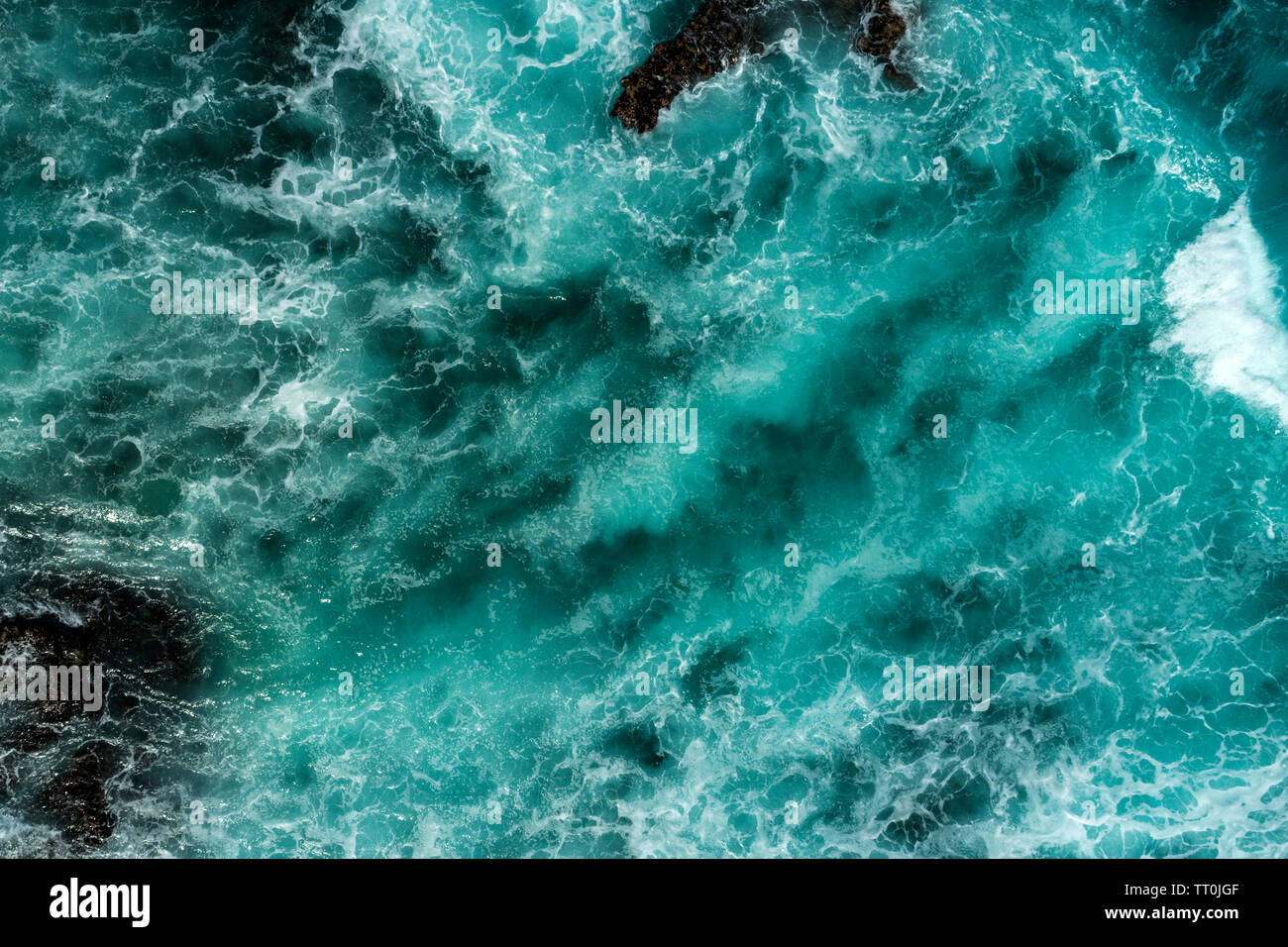 Aerial view of the Indian Ocean breaking onto a reef, Northwest Australia. Stock Photo