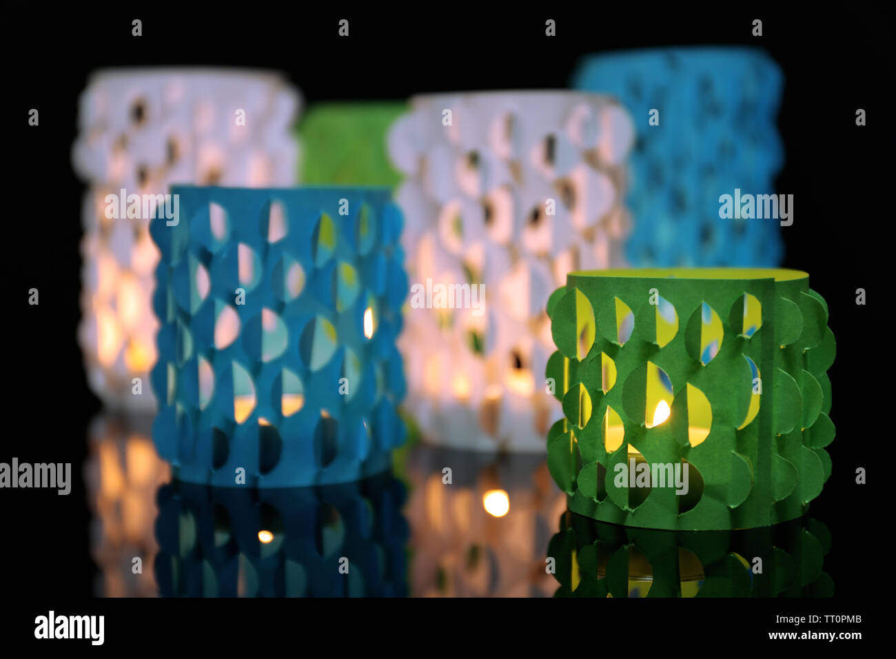 Home decor, candle lights on black background Stock Photo - Alamy