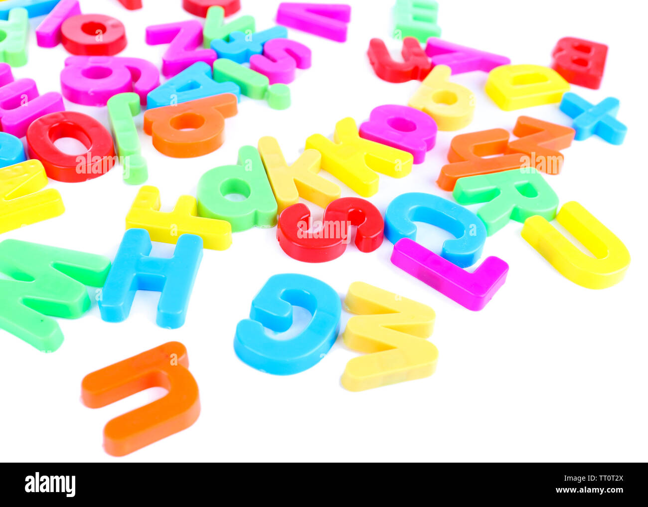 Colorful magnetic letters isolated on white Stock Photo - Alamy