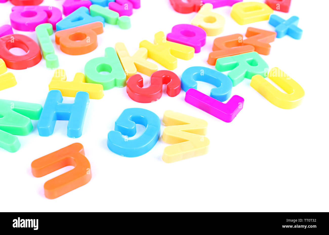 Colorful magnetic letters isolated on white Stock Photo - Alamy