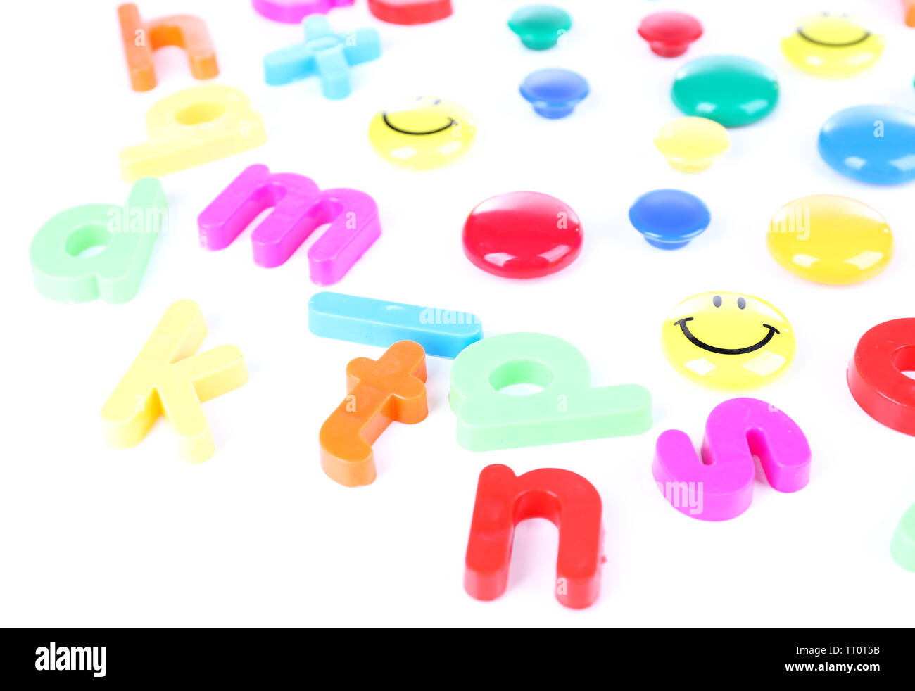 Colorful magnetic letters isolated on white Stock Photo - Alamy