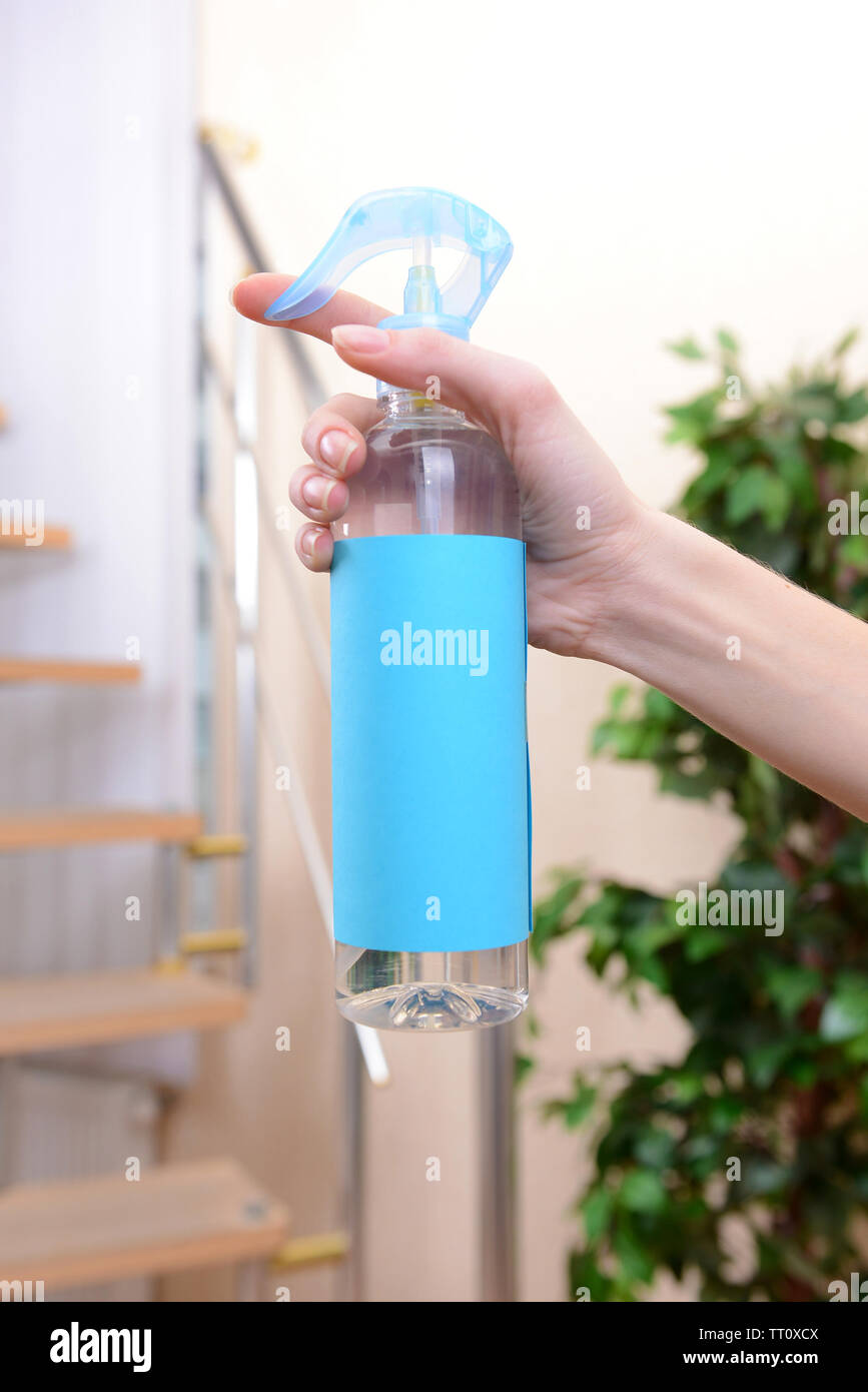 Sprayed air freshener in hand closeup Stock Photo Alamy