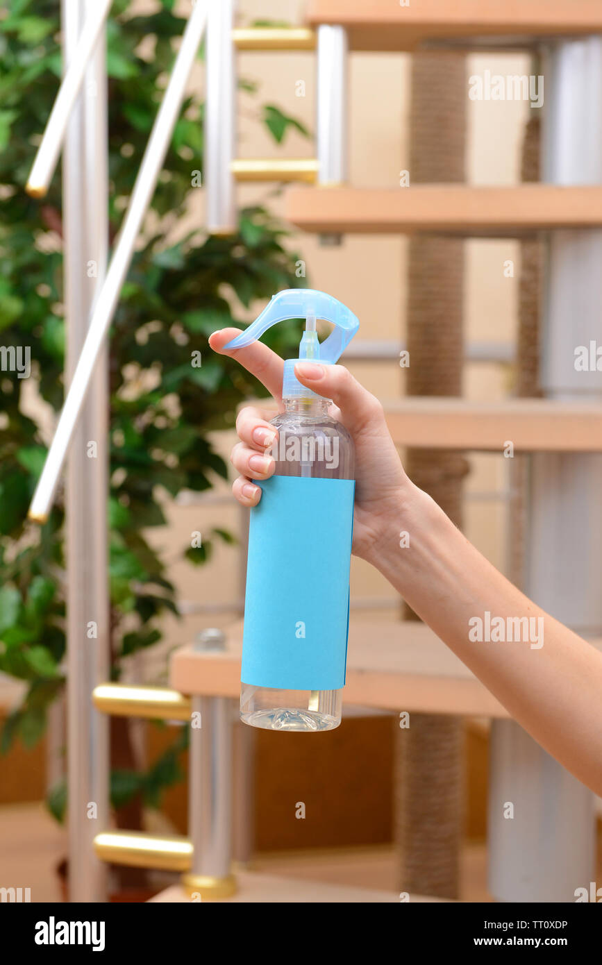 Sprayed air freshener in hand closeup Stock Photo Alamy