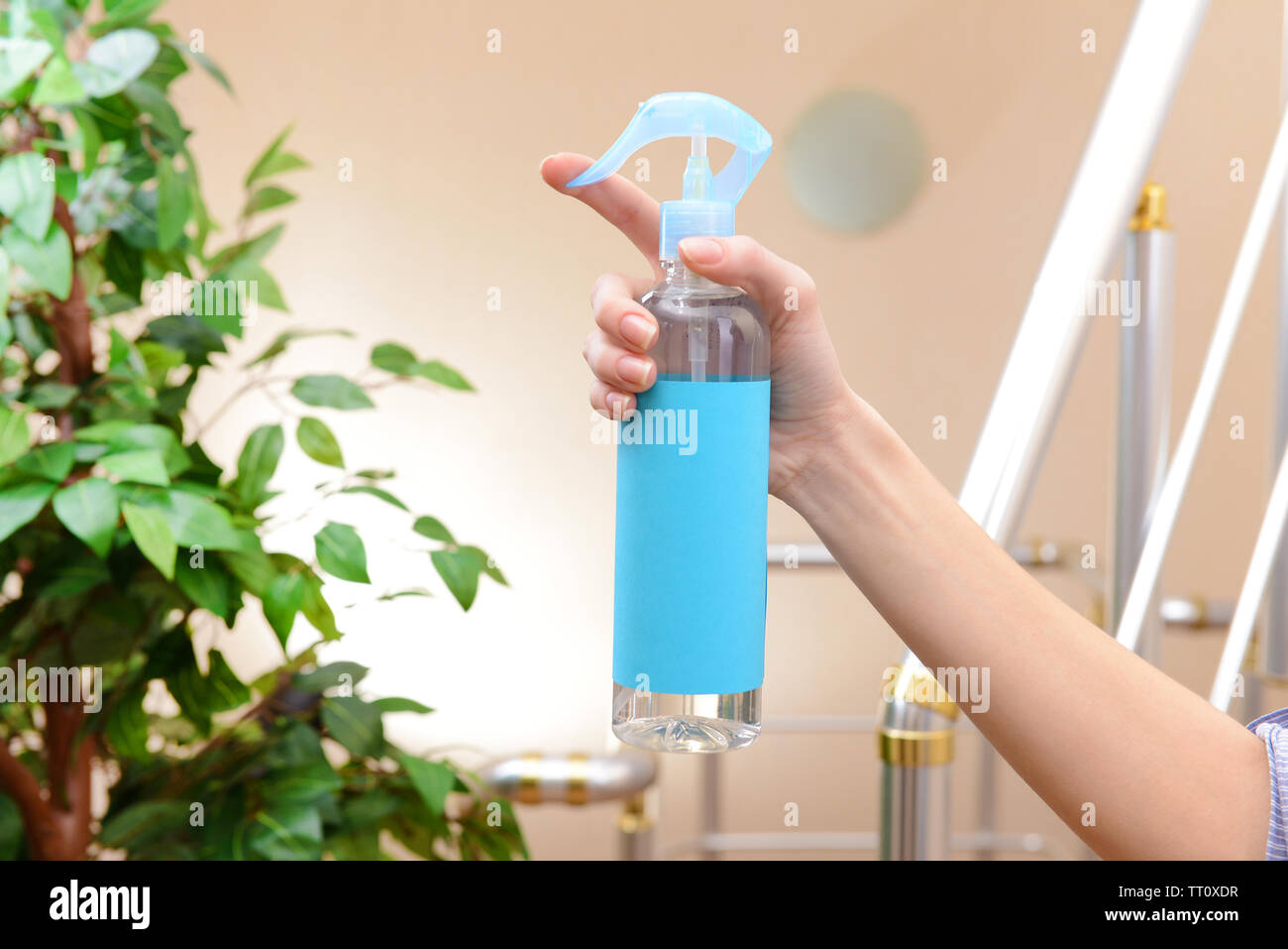 Sprayed air freshener in hand closeup Stock Photo Alamy