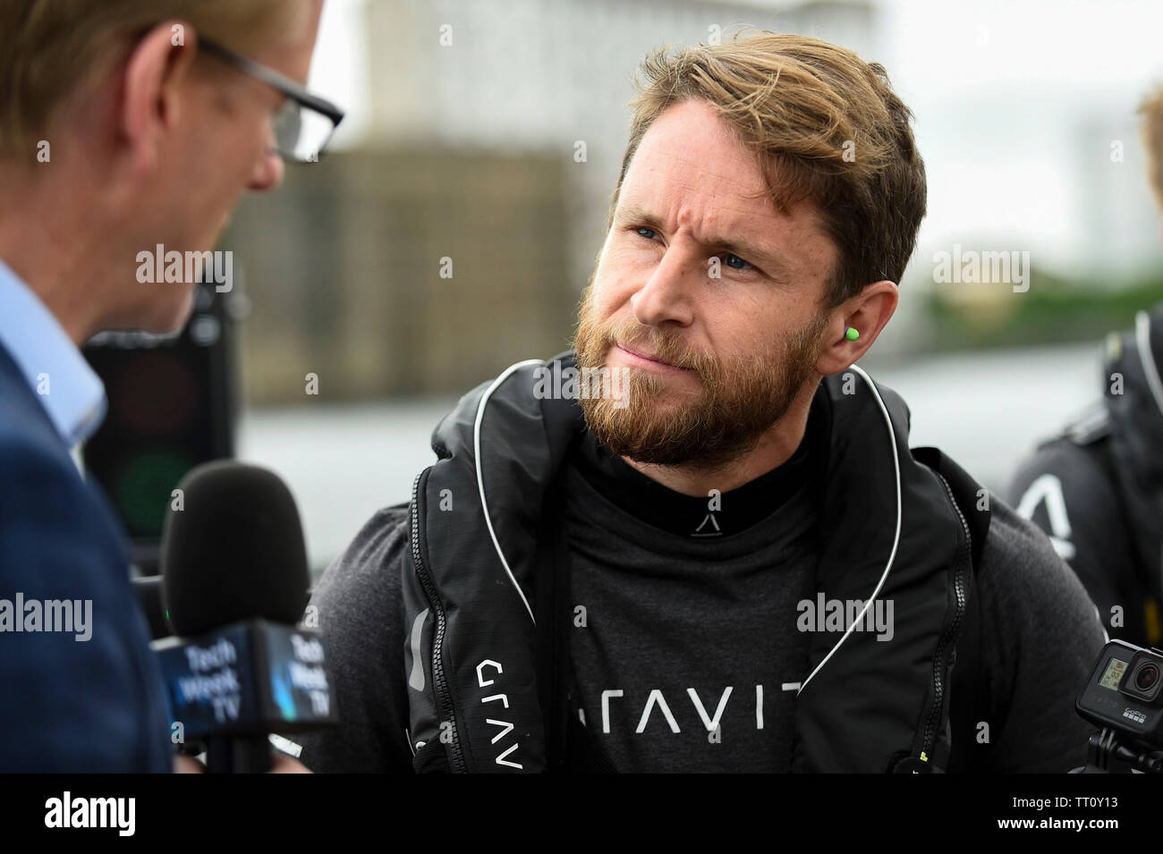 London, UK.  13 June 2019.  Richard Browning the Founder and Chief Test Pilot of Gravity Industries and ‘real life Iron Man’ gives a media interview to preview their Race Series concept at Royal Victoria Docks, East London, during London Tech Week 2019, ahead of the launch of Gravity Industries’ International Race Series in early 2020.  Gravity Industries are the designers, builders and pilots of the world’s first patented Jet Suit, pioneering a new era of human flight. Credit: Stephen Chung / Alamy Live News Stock Photo