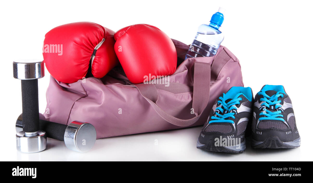 Sports bag with sports equipment isolated on white Stock Photo - Alamy