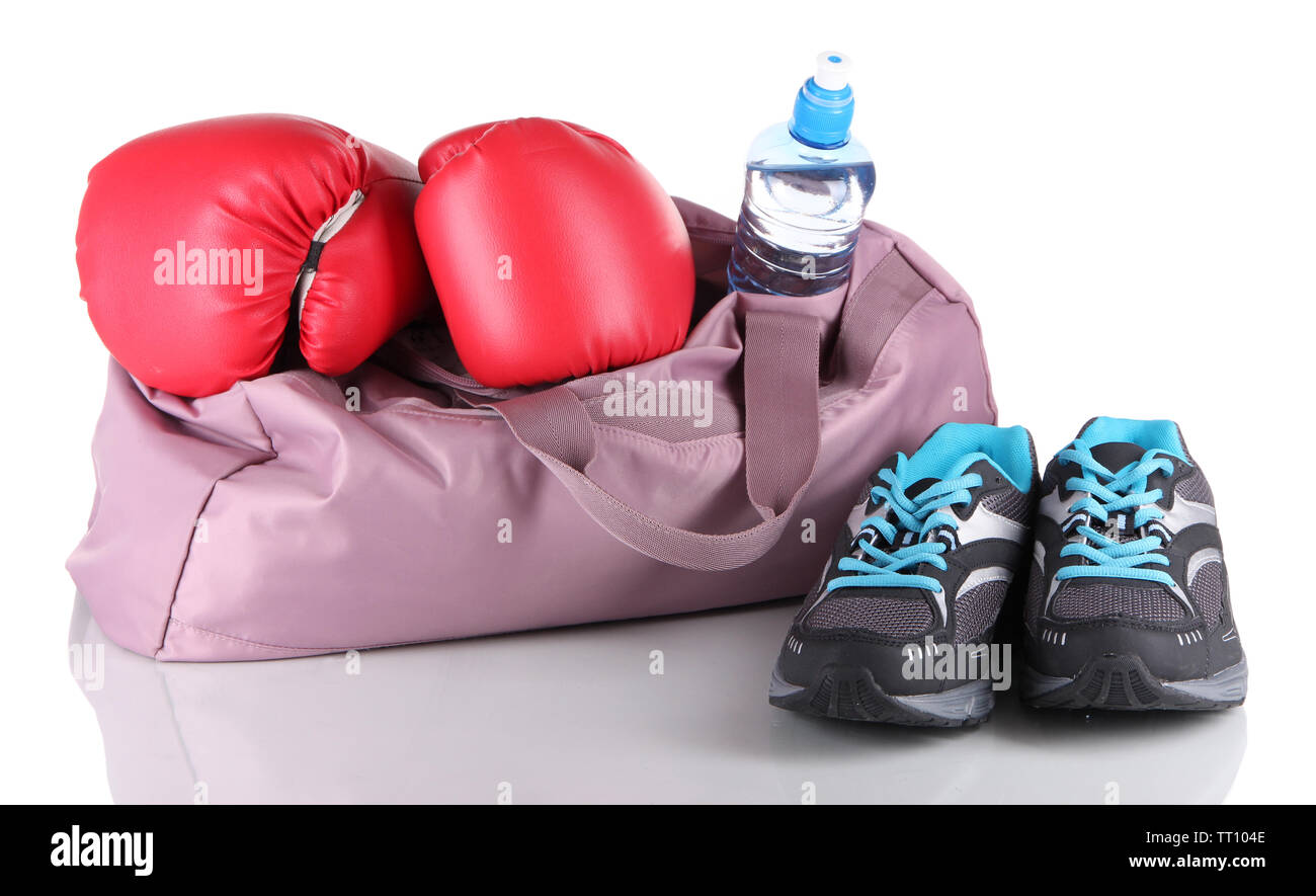 Sports bag with sports equipment isolated on white Stock Photo - Alamy