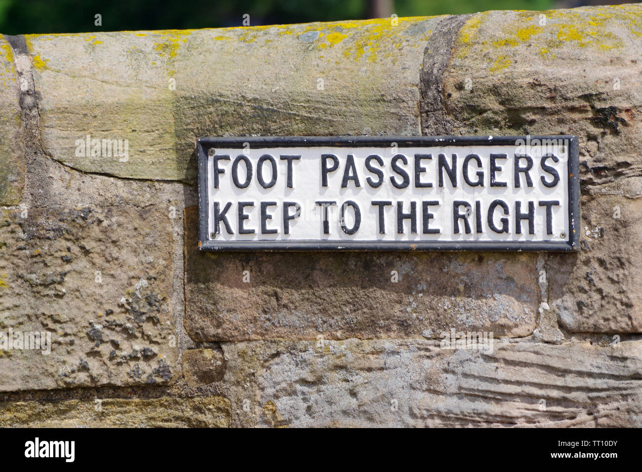 'Foot passengers keep to the right' sign on the Berwick Bridge over the River Tweed in Berwick upon Tweed. Stock Photo