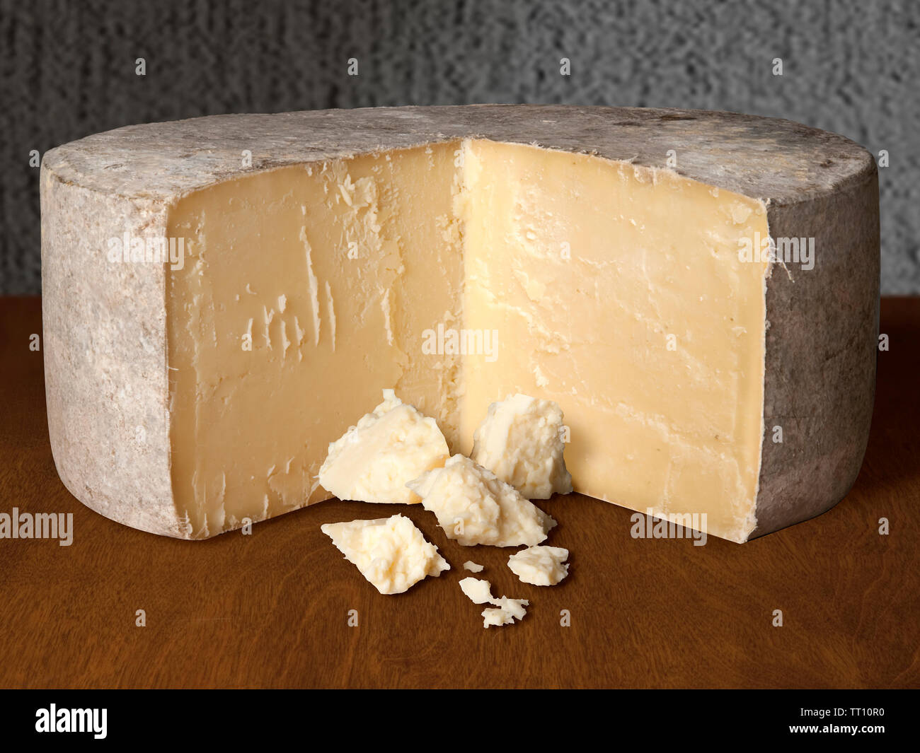 Cave Aged Cheddar Wheel Stock Photo Alamy