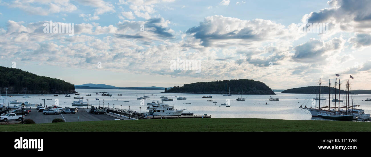 Bar Harbor Maine's waterfront view with fluffy white and dark clouds