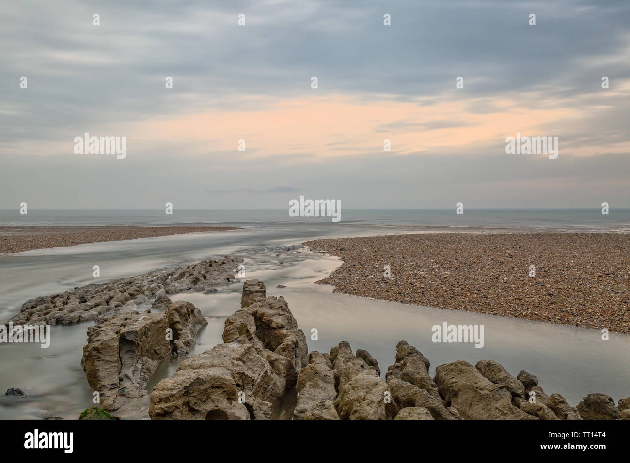 The tidal channel into RSPB Medmerry on the south coast of England Stock Photo