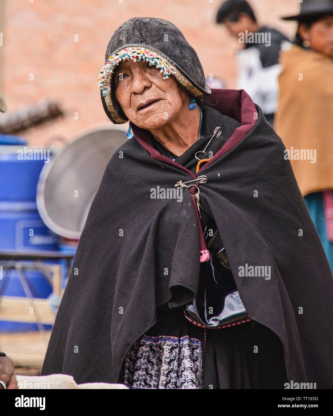 Traditional Yampara women with leather hats, Tarabuco, Bolivia Stock Photo