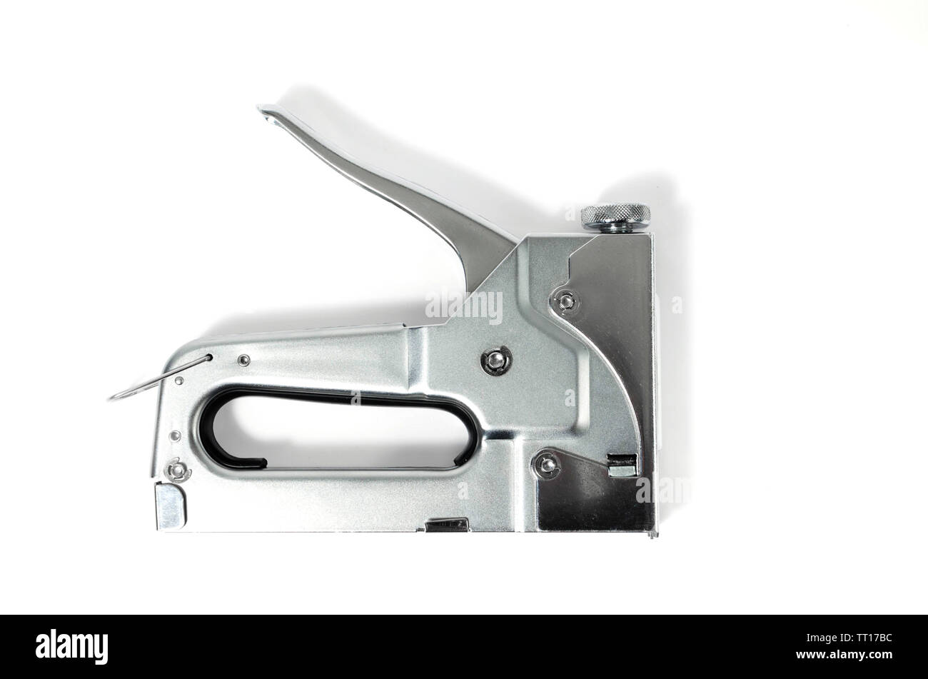 Metal Nickel plated stapler gun on white background, isolate close up. Stock Photo