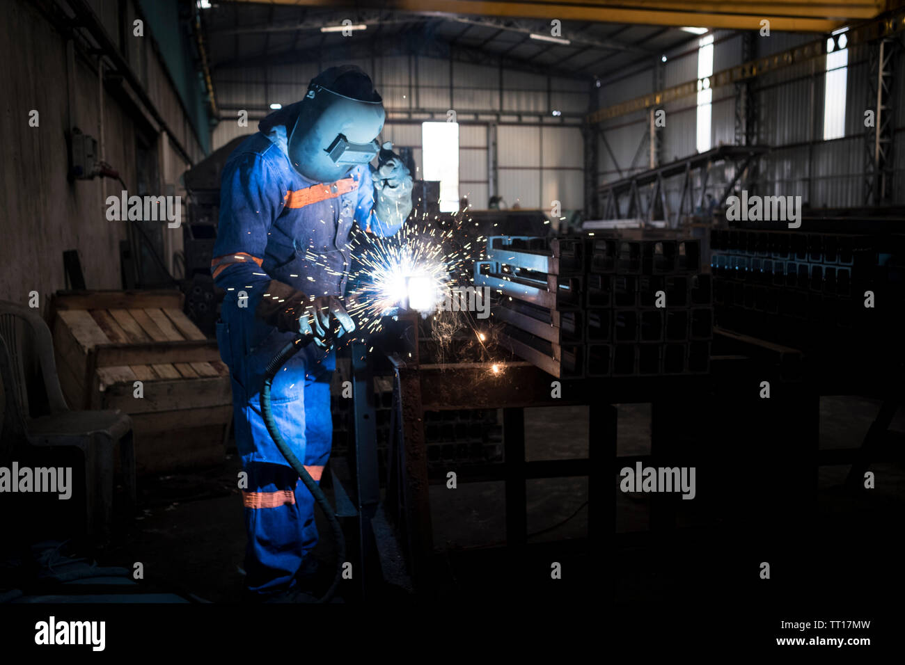 Welder master welding steel or iron, metal industry concept photo Stock Photo