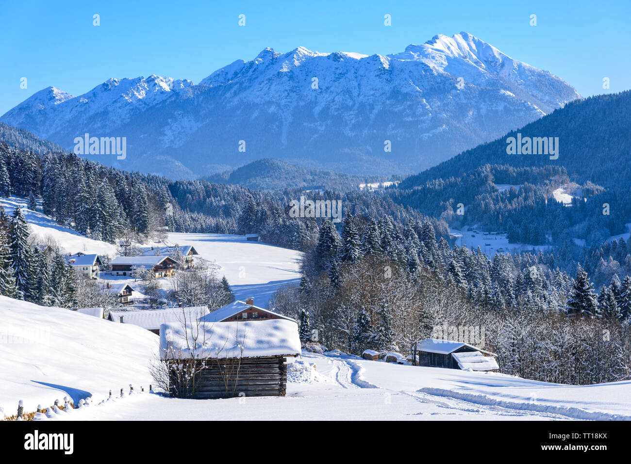 Idyllic scenery on a cold and sunny winter morning in upper bavarian alps near Garmisch-Partenkirchen Stock Photo