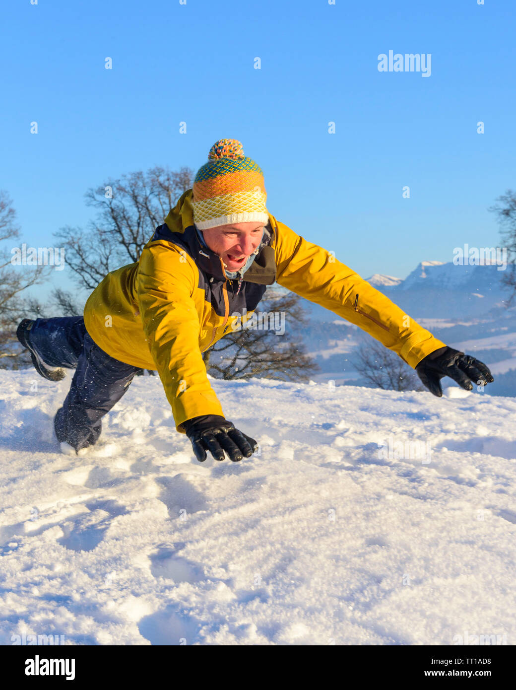 Funny games in fresh snow in afternoon Stock Photo