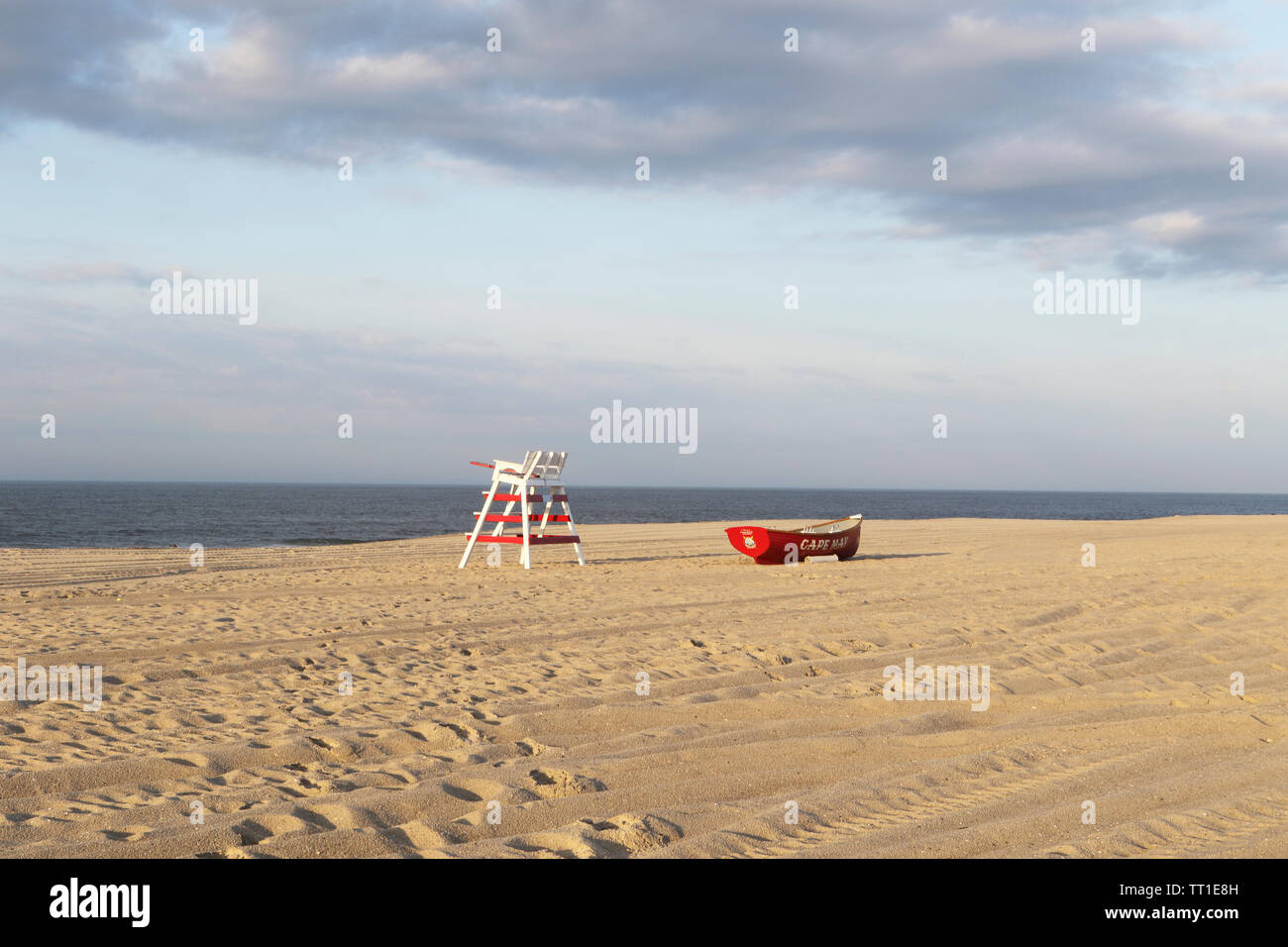 A lifeguard chair with a lifeboat on the beach in Cape May, New Jersey