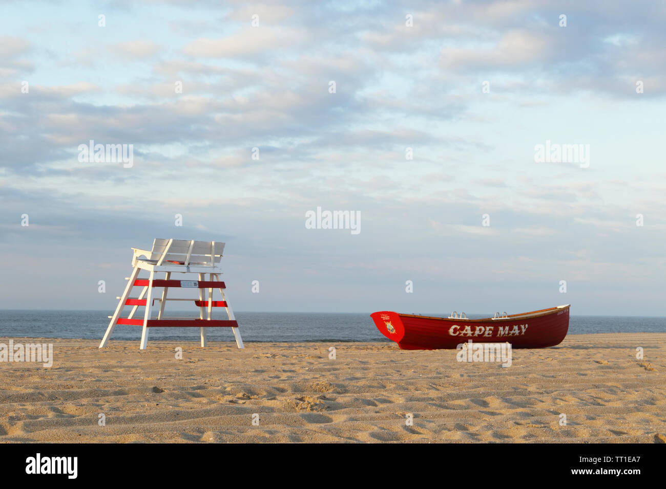 A lifeguard chair with a lifeboat on the beach in Cape May, New Jersey