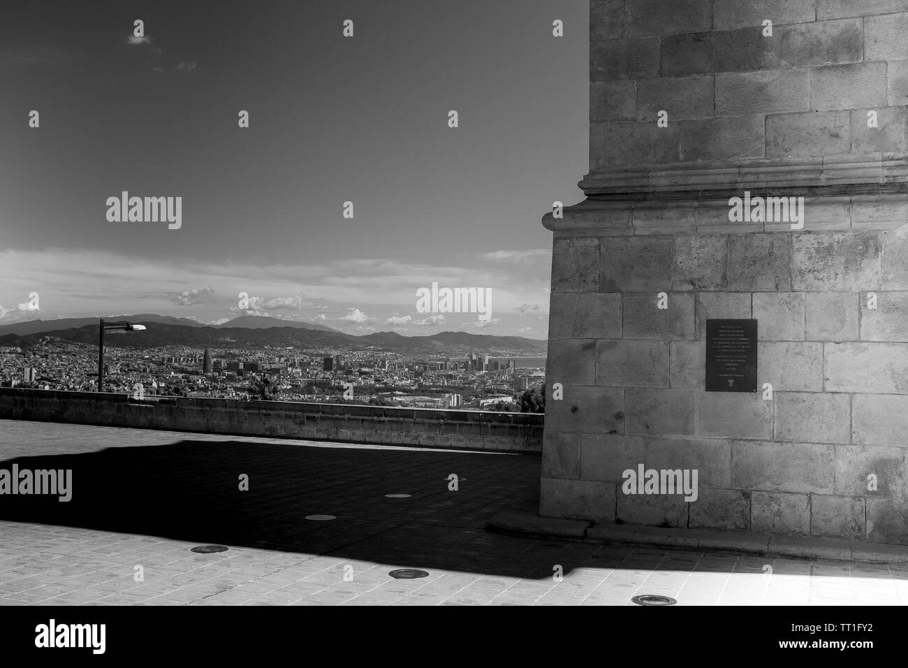 Stunning view of Barcelona, shot taken a few steps from the watchtower of the castle located on the Montjuic hill,  horizontal composition, black and Stock Photo
