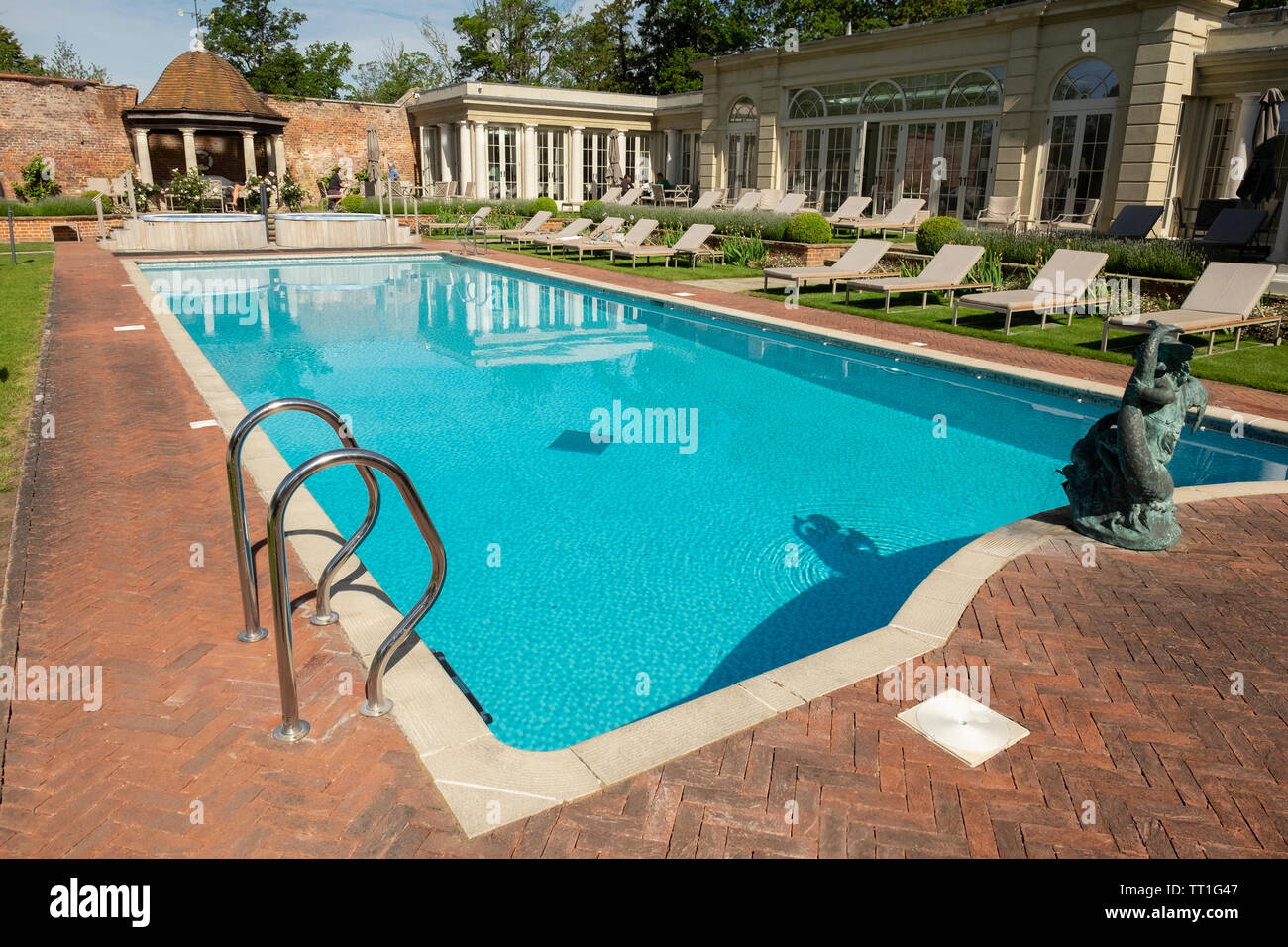 Outdoor swimming pool at Cliveden House luxury hotel, near Maidenhead, England, UK. Where Christine Keeler first met Profumo in the Profumo scandal. Stock Photo