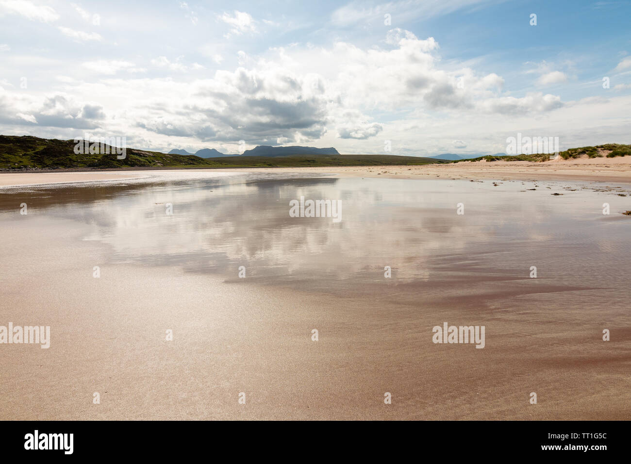 Reflections on Achnahaird beach Stock Photo Alamy