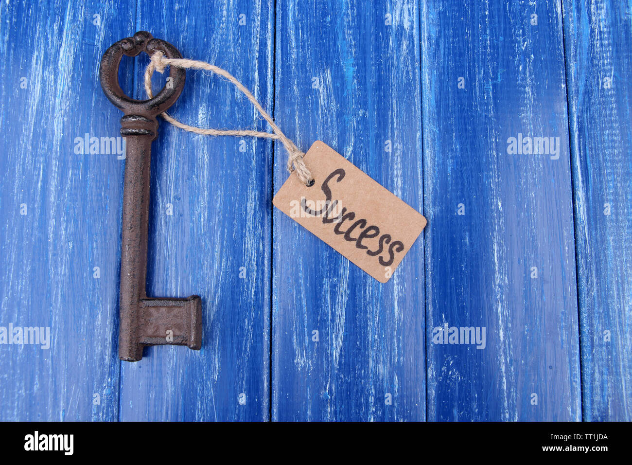 Key to success, Conceptual photo. On color wooden background Stock ...