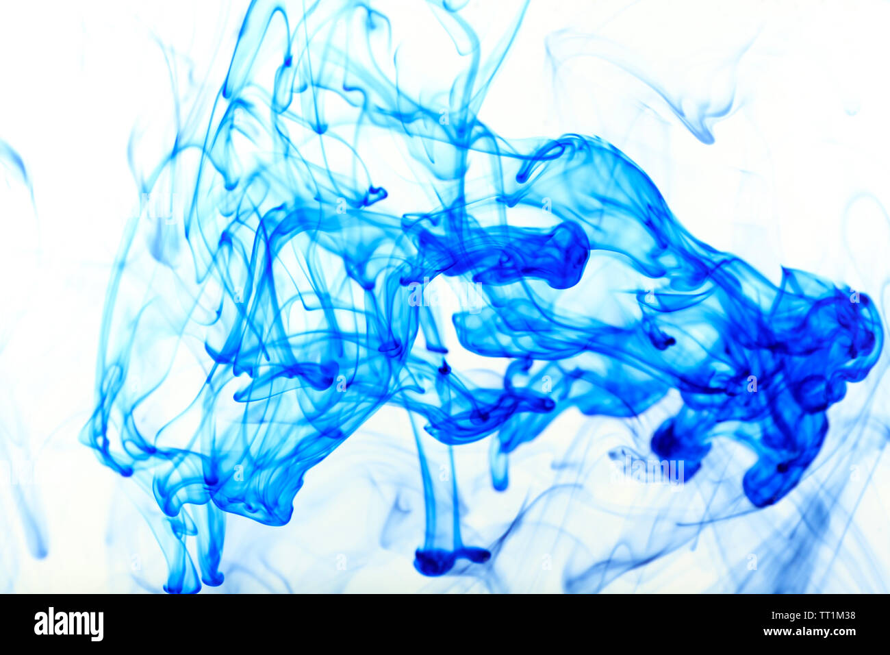 Ink in water isolated on white Stock Photo - Alamy