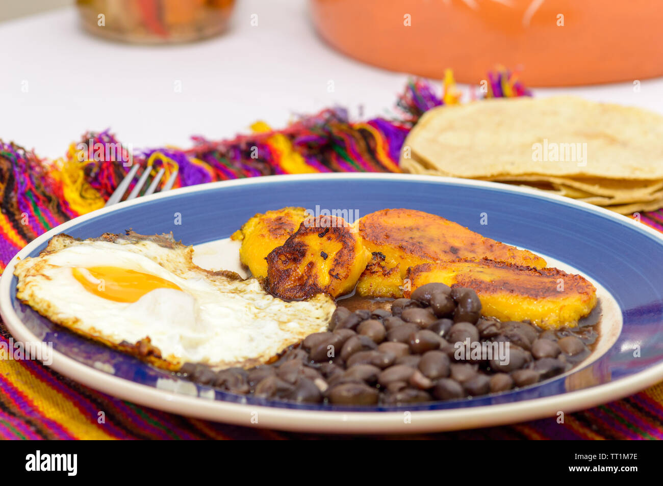 Mexican tropical breakfast, made with plantains, eggs and black beans