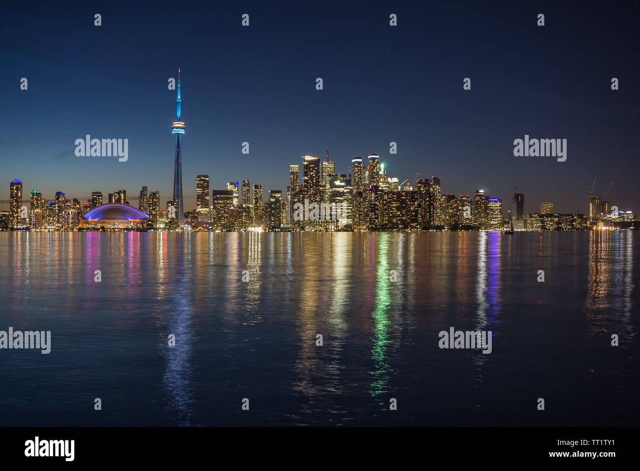 Canada, Toronto, skyline with the CN Tower, view of flooded island in the blue hour, water reflections, June 2019 Stock Photo