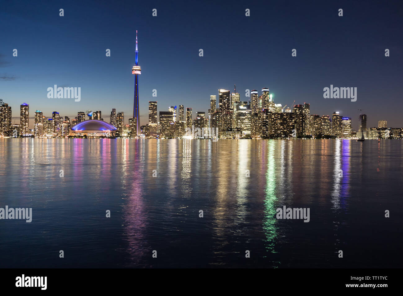 Canada, Toronto, skyline with the CN Tower, view of flooded island in the blue hour, water reflections, June 2019 Stock Photo