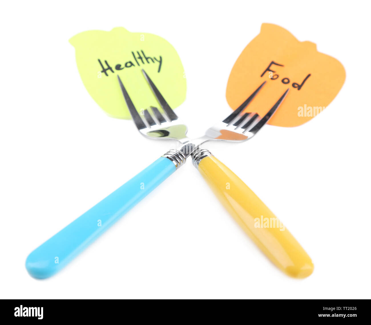 Note papers with messages attached to forks, isolated on white Stock Photo