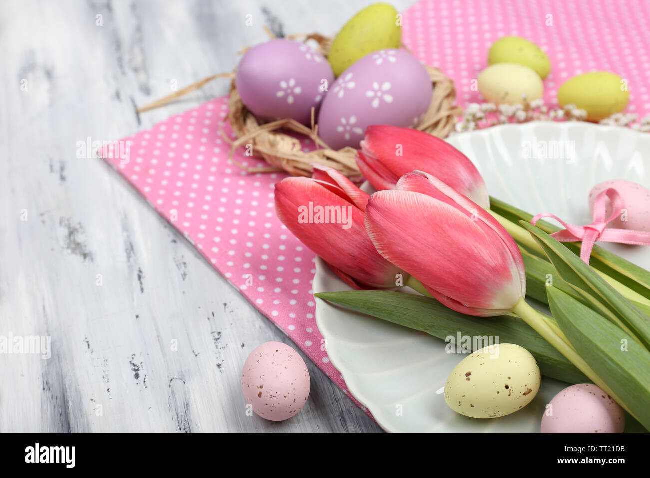 Easter table setting with tulips and eggs Stock Photo - Alamy