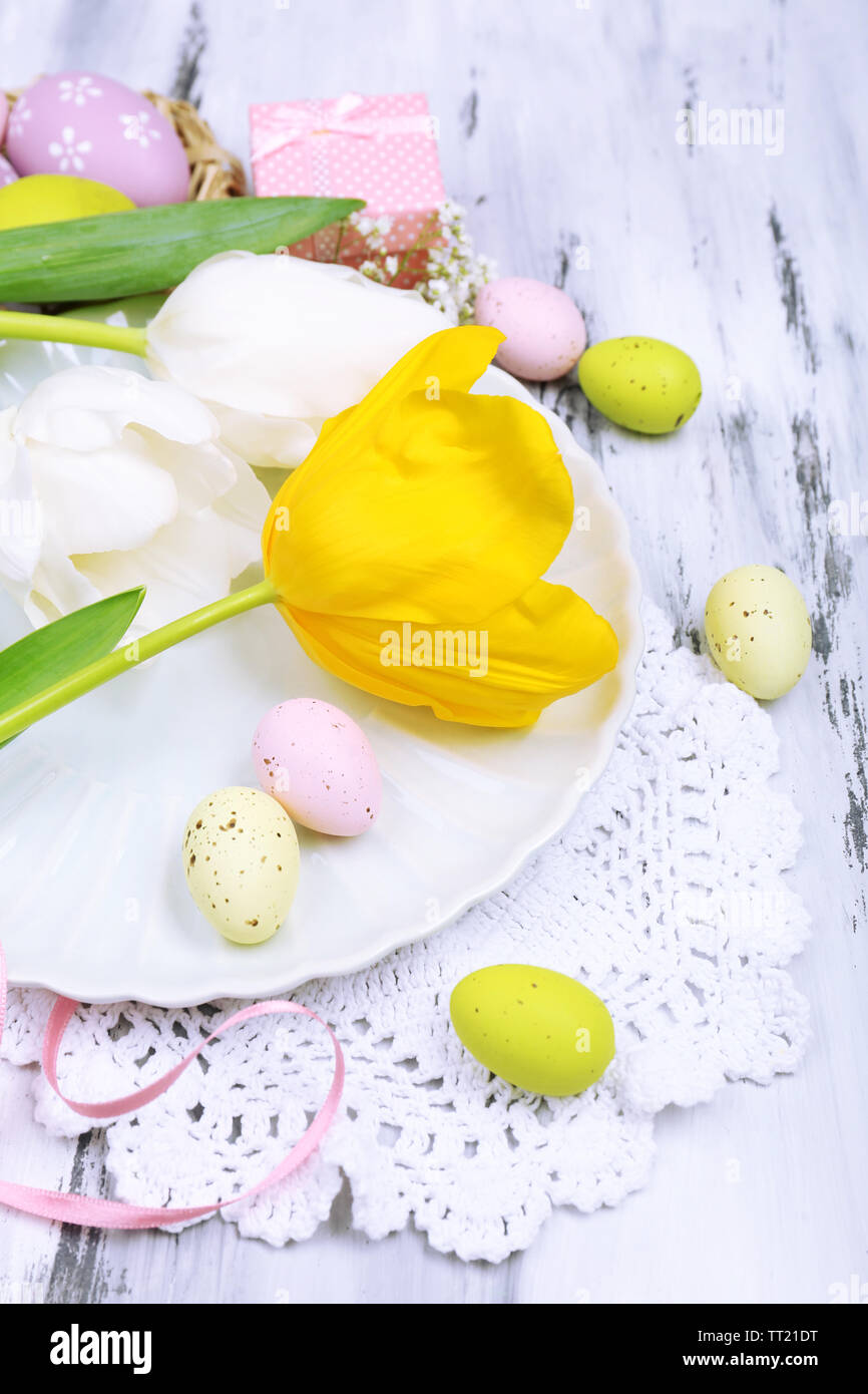 Easter table setting with tulips and eggs Stock Photo - Alamy