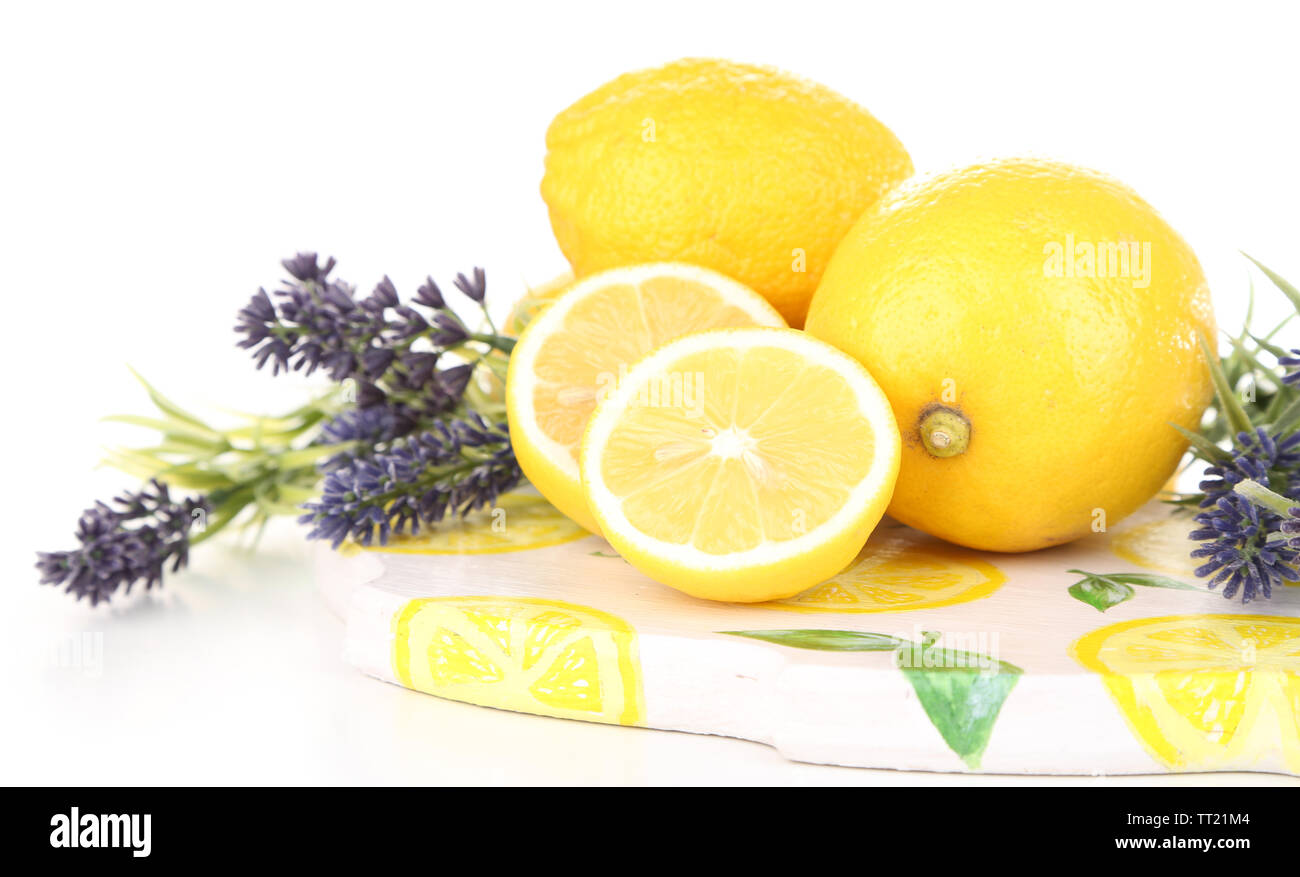 Still life with fresh lemons and lavender, isolated on white Stock