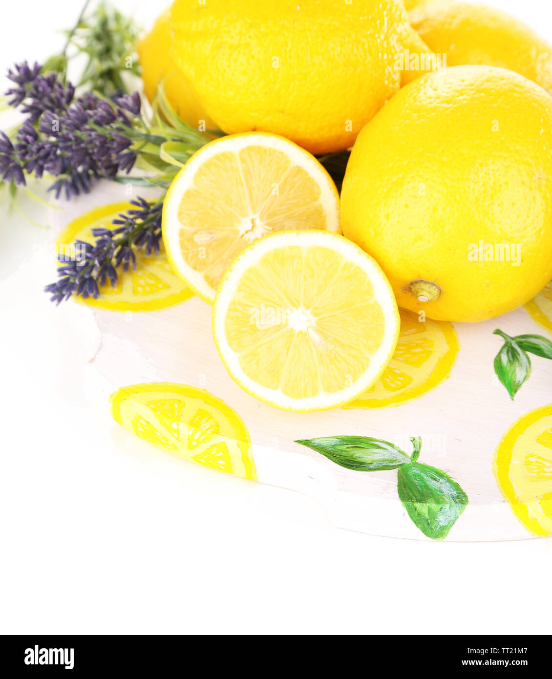 Still life with fresh lemons and lavender, isolated on white Stock