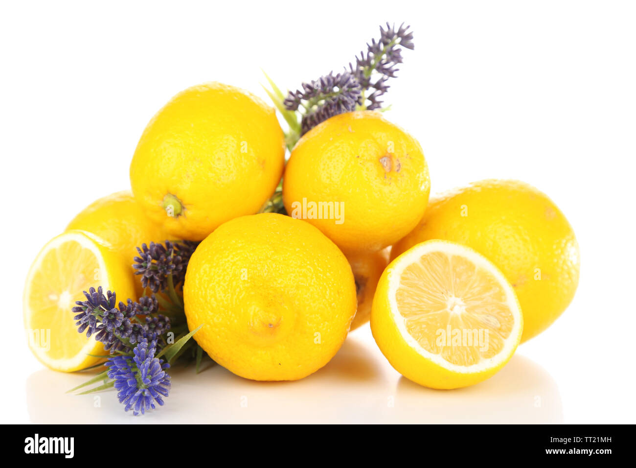 Still life with fresh lemons and lavender, isolated on white Stock