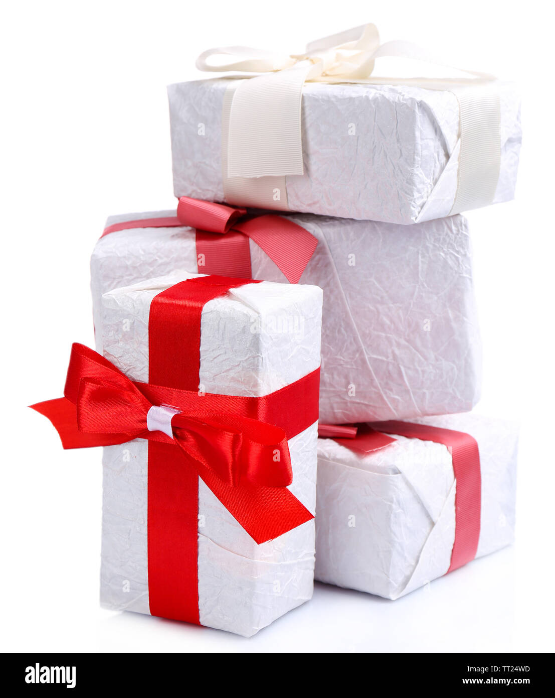 Beautiful gifts with red ribbons, isolated on white Stock Photo - Alamy